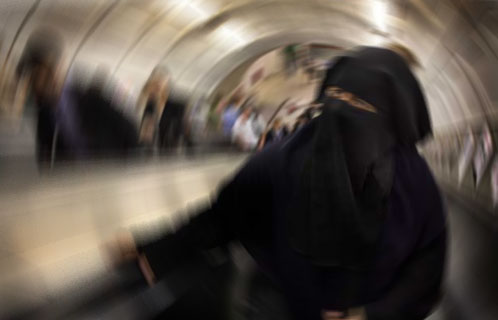 Niqab Ban Lifts Veil on Problems East and West