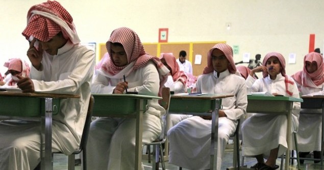 Secondary students sit for an exam in a government school in Riyadh